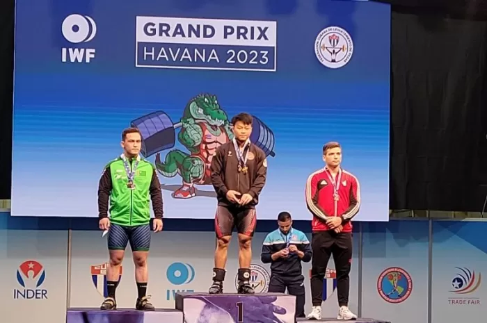 Lifter Indonesia Rahmat Erwin Sabet 3 Emas di Grand Prix IWF Kuba
