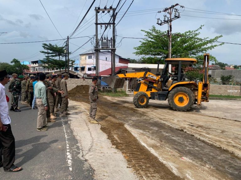 Pembongkaran Tembok Pembatas di Jalan D.I Panjaitan Tanjungpinang Berujung Laporan ke Polda Kepri